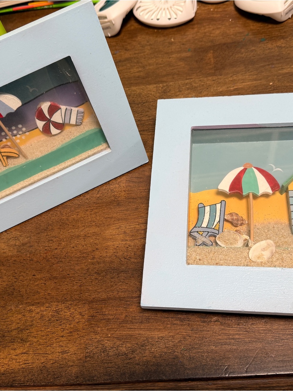 Source Unknown Light Blue Coastal Shadow Box Pair with Multi-Color Umbrella